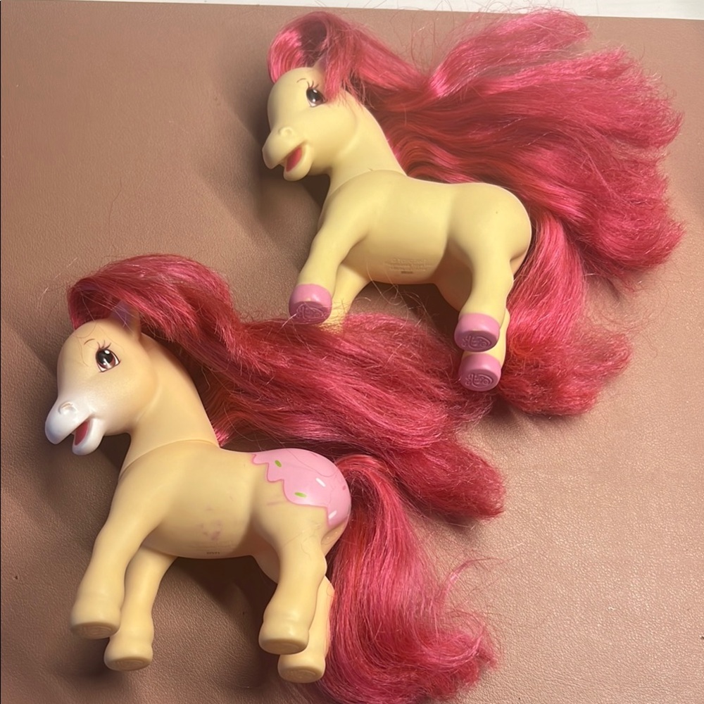 Pink and Cream Unicorn Dolls with Flowing Manes